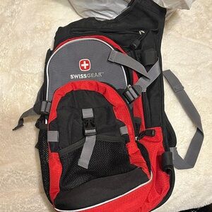 SwissGear Black and Red Sling Backpack with Gray Accents
